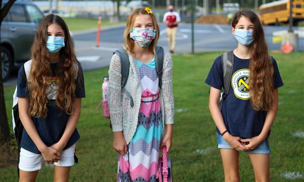 students smile on first day of school
